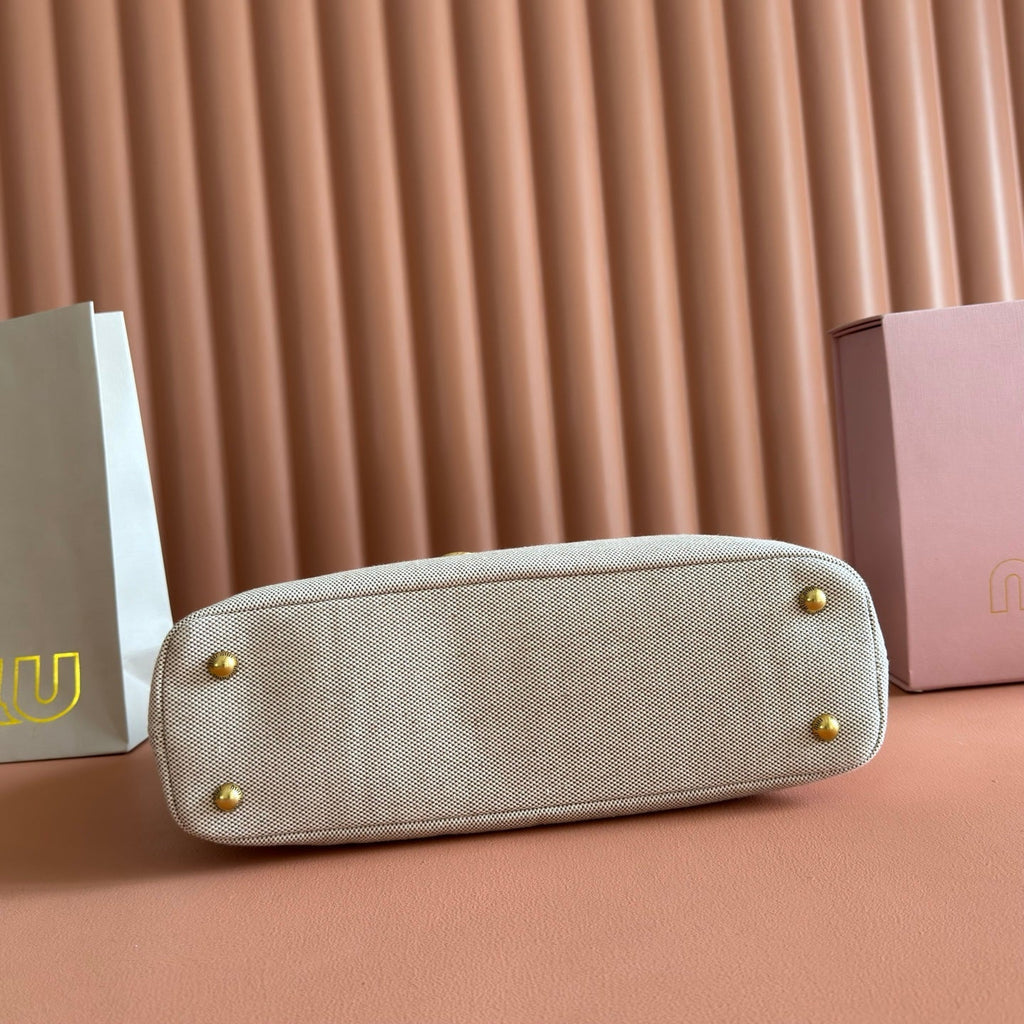 Miu Miu Aventure Handbag 31 Beige in Canvas 285305