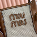 Miu Miu Aventure Handbag 31 Beige in Canvas 285305