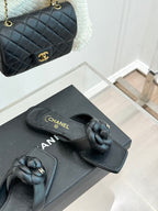 Chanel 26 Camellia Flip-Flops Black in Cowhide 706386