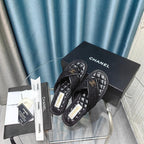 Chanel 26P Flip-Flops Black in Woven 712310