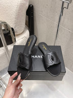 Chanel Double C Flat Slip-on Sandals Black in Lambskin 740703