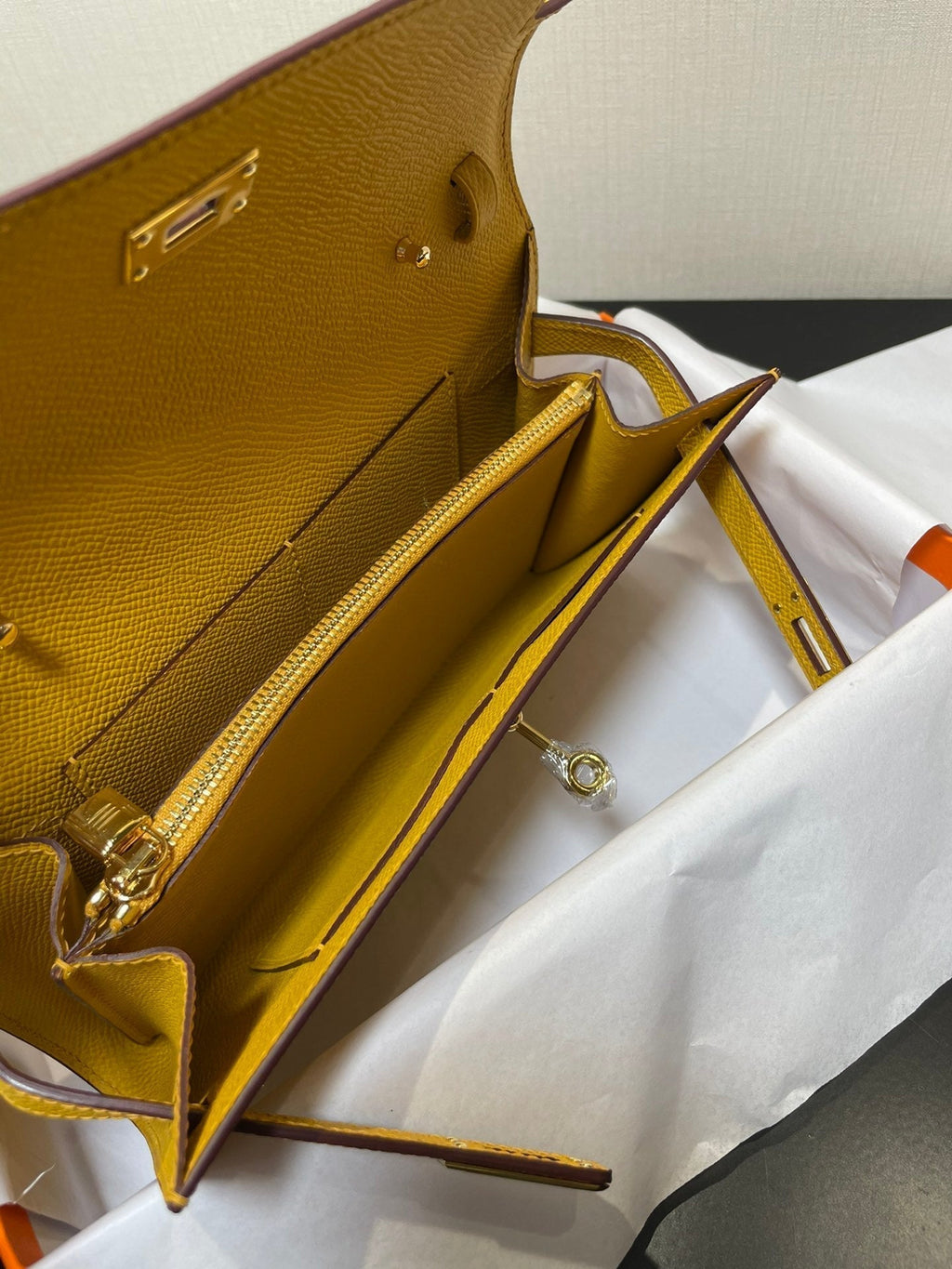 kelly to go wallet 20.5 yellow epsom gold hardware