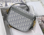 MEDIUM CD BOBBY 22CM GREY OBLIQUE CANVAS GOLD HARDWARE