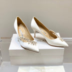 Manolo Women's Nadira Pumps 70 White Satin