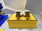 FENDI FIRST HIGH HEEL 95 MM SANDAL IN WHITE MINK FUR
