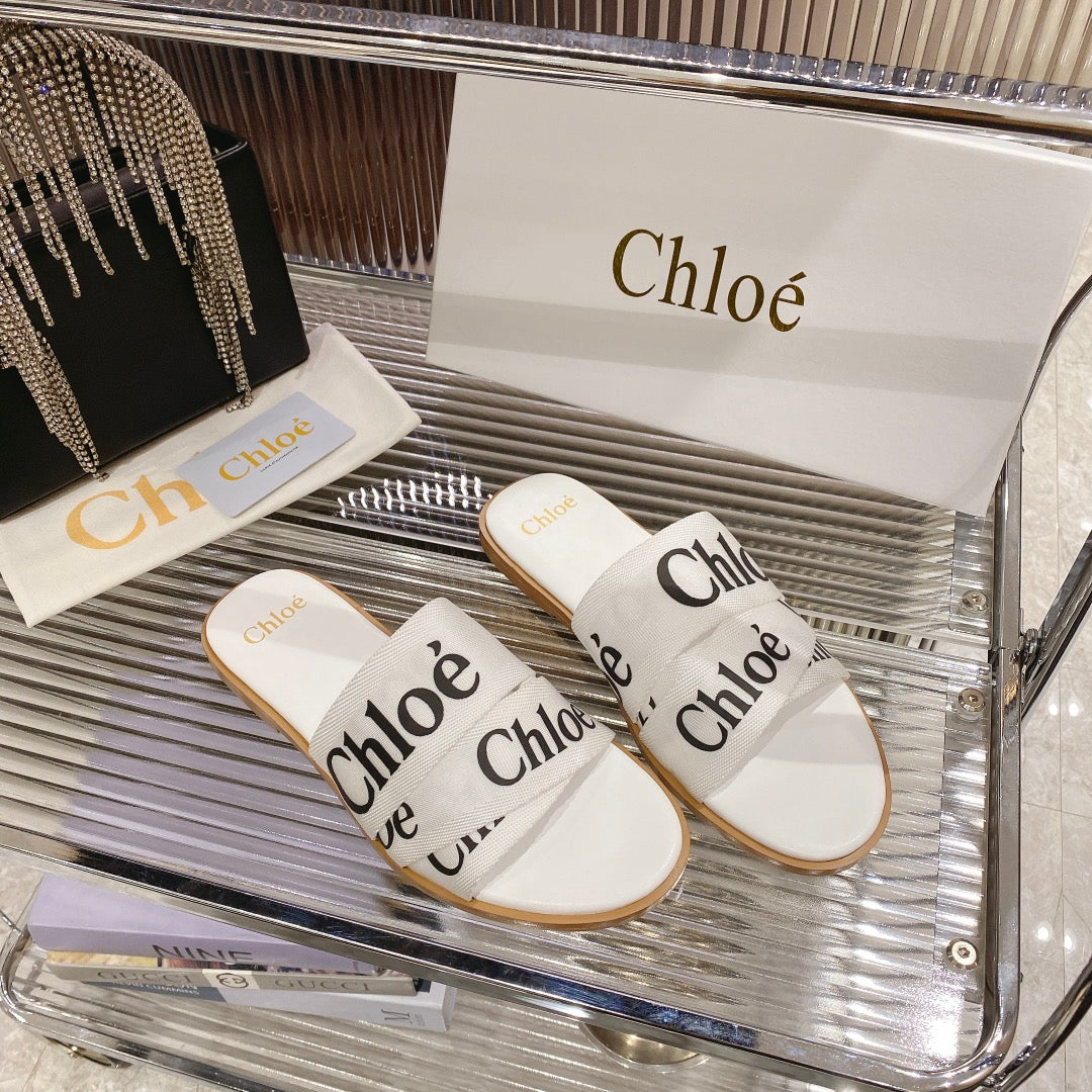CHLOÉ WOODY SLIPPER IN WHITE MIX BLACK CANVAS
