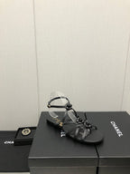 FLORAL FLAT SANDAL IN BLACK LAMBSKIN