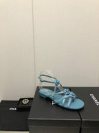 FLORAL FLAT SANDAL IN SAPPHIRE BLUE LAMBSKIN