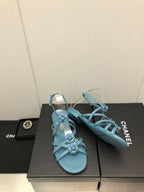 FLORAL FLAT SANDAL IN SAPPHIRE BLUE LAMBSKIN