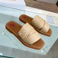 CHLOÉ WOODY MULE IN TUSCAN BEIGE LAMBSKIN WITH EMBROIDERED LOGO