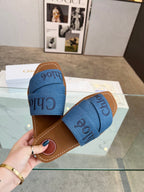 CHLOÉ WOODY MULE IN COBALT BLUE DENIM WITH EMBROIDERED LOGO