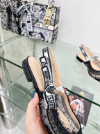 cd slingback flat transparent mesh embroidered black flower moitf