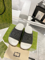 GC 25 Interlocking G 50mm Slide Sandal Jet Black White Cowhide 292381