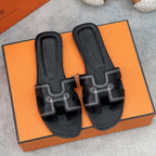 0ran sandal black white epsom