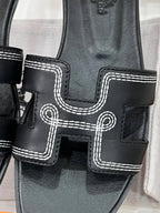 0ran sandal black white epsom