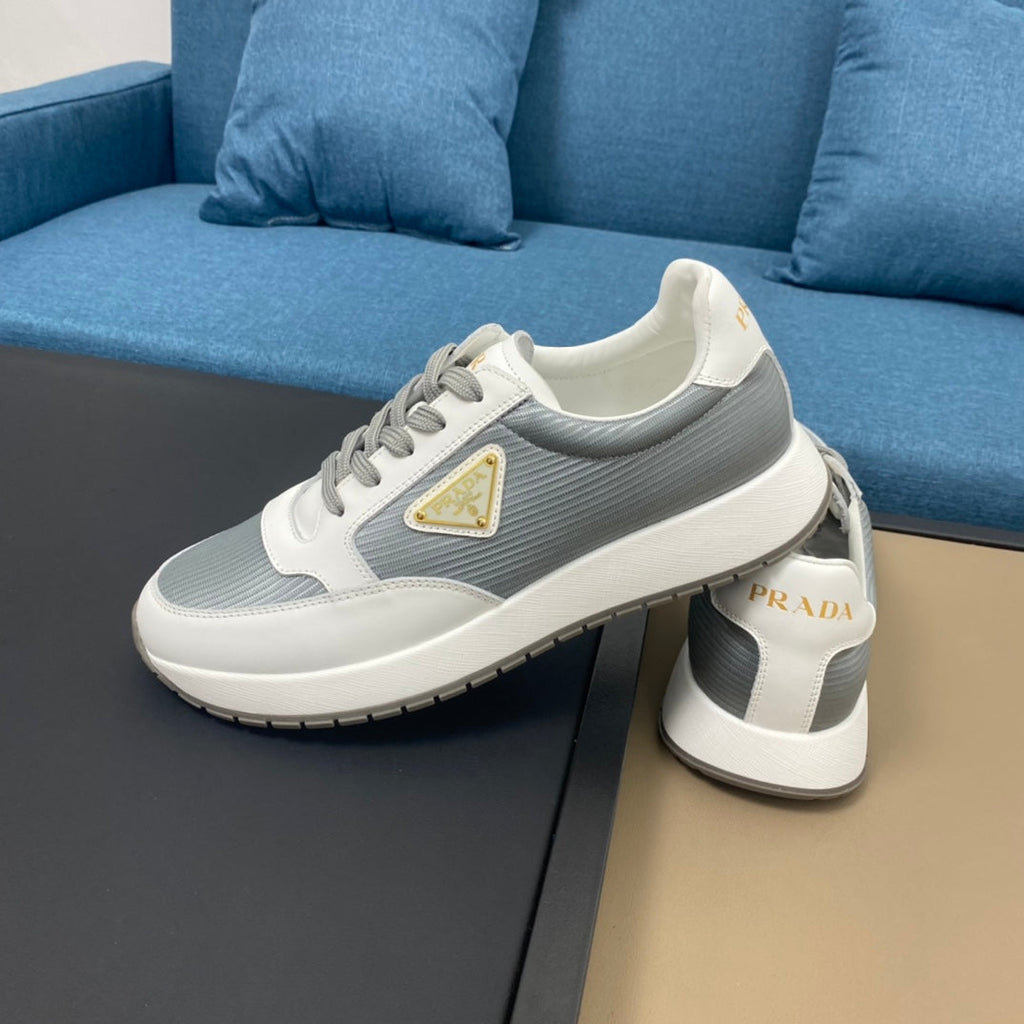 PRA SNEAKER IN WHITE CALFSKIN AND SILVER FABRIC WITH GOLDEN LOGO