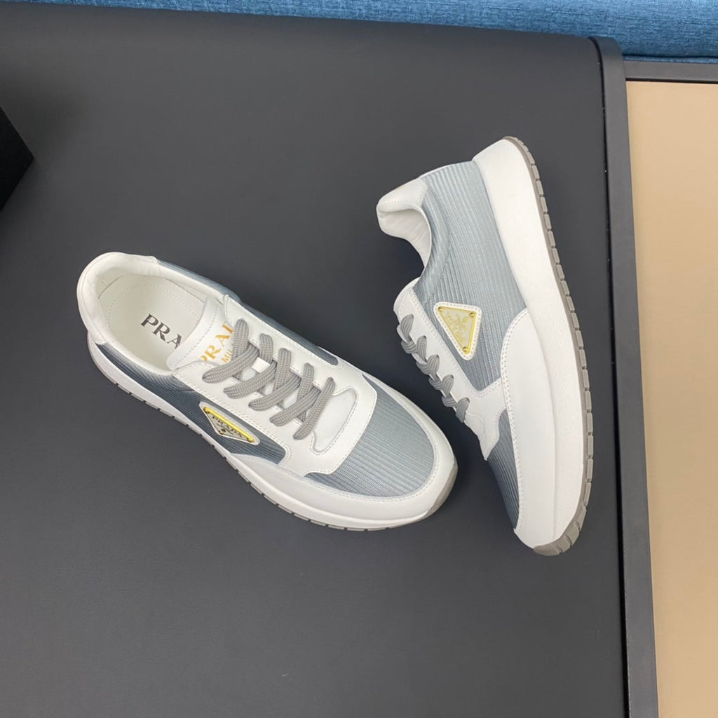 PRA SNEAKER IN WHITE CALFSKIN AND SILVER FABRIC WITH GOLDEN LOGO