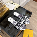 FENDI FLORAL SLIDES IN BLACK MIX WHITE FABRIC