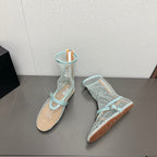 ALAIA SHORT BOOTS IN LIGHT BLUE MESH FISHNET