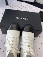 LOW-CUT BOOTS IN BLACK MIX WHITE CALFSKIN