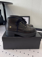 LOW-CUT BOOTS IN BLACK CALFSKIN