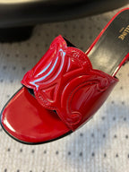 CLEMENCE MULE IN RUBY RED LAMBSKIN AND PATENT CALFSKIN