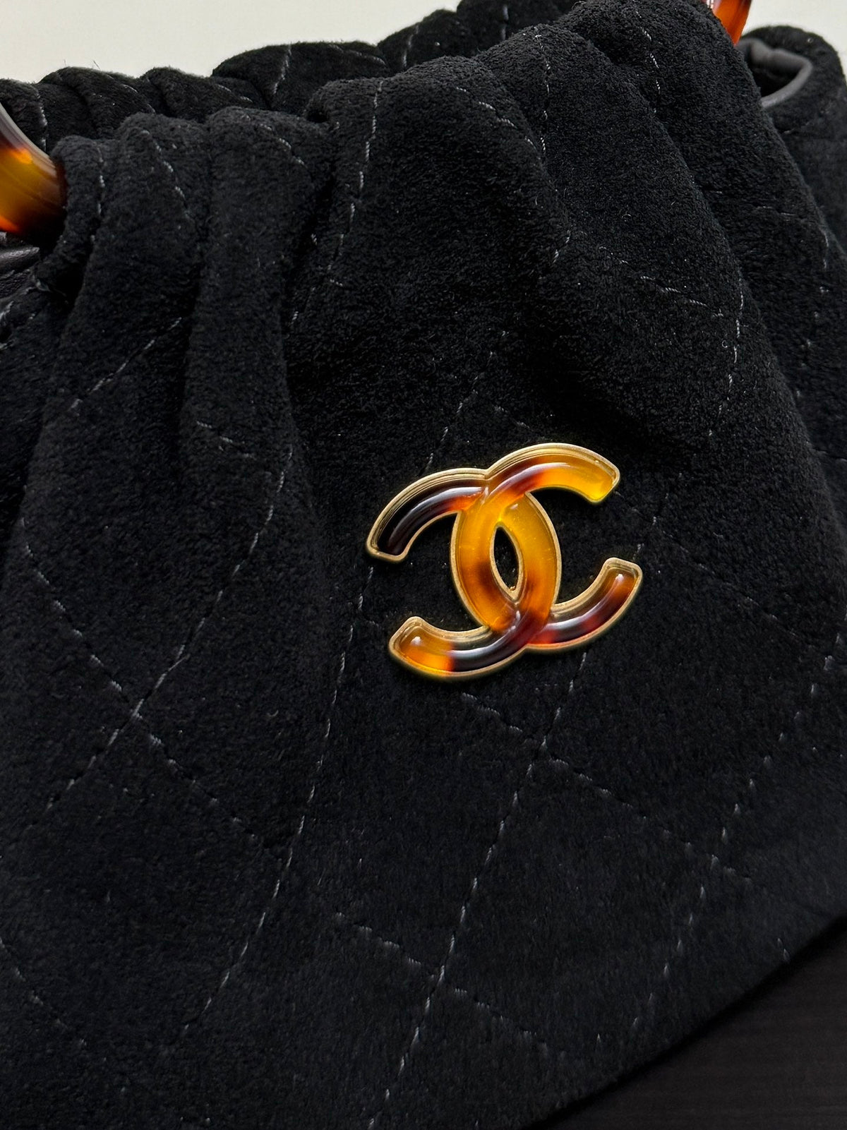 Chanel 2026 Mini Pouch 16cm Black Tortoiseshell Suede Effect Plexi
