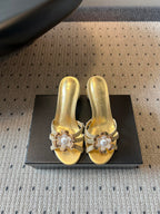 CC 2026s Pearl Camellia Sandals 7cm Gold Cowhide 719456