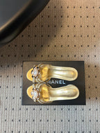 CC 2026s Pearl Camellia Sandals 7cm Gold Cowhide 719456