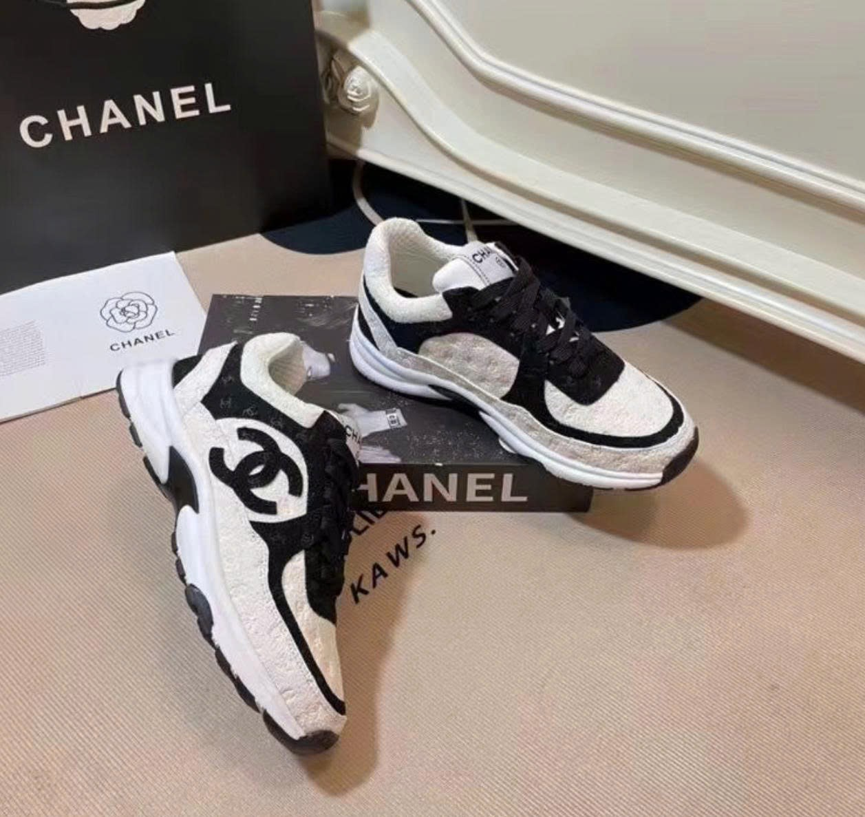 CC sneaker black and white suede calfskin