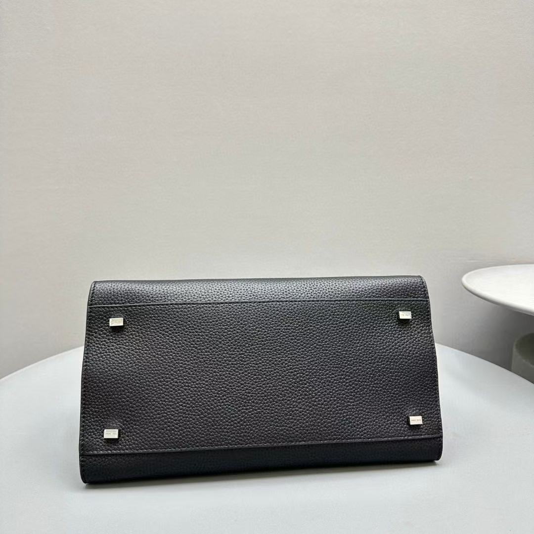 The Row Margaux 15 Black Leather