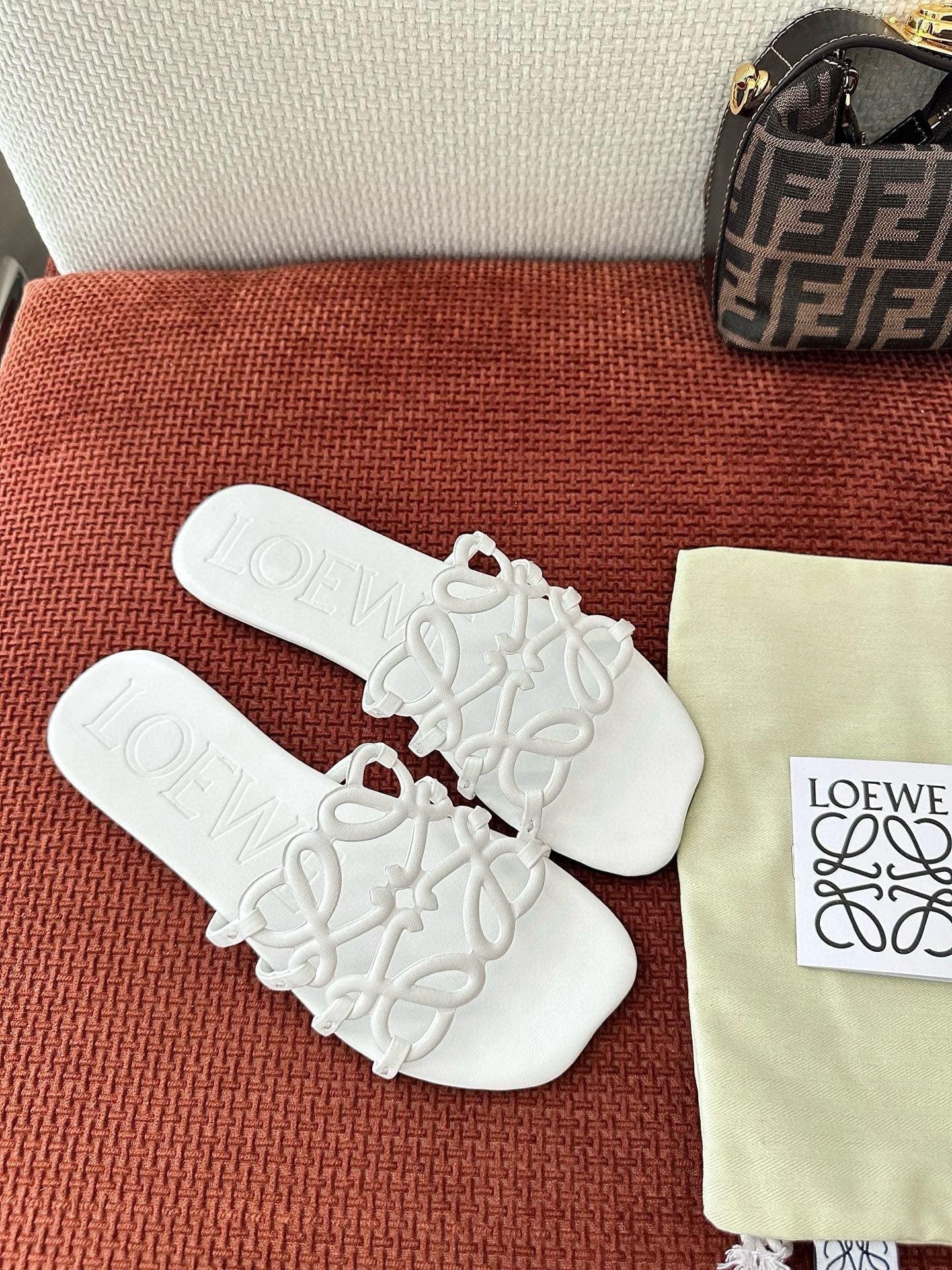 Loewe 25 Petal Anagram Slides White Cowhide