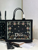 CD Book Tote Black with Revolution Flowers in Canvas 288342