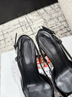 POINTED HIGH SLINGBACK IN BLACK PATENT CALFSKIN WITH CRYSTAL BUCKLE