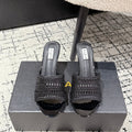 ALAIA Muller high-heeled black woven leather