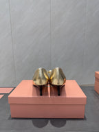 Miu 26s Pointed Toe Pumps 55mm In Gold Calfskin With Bow