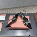 Miu 26s Slingback 55mm In Black White Calfskin With Bow