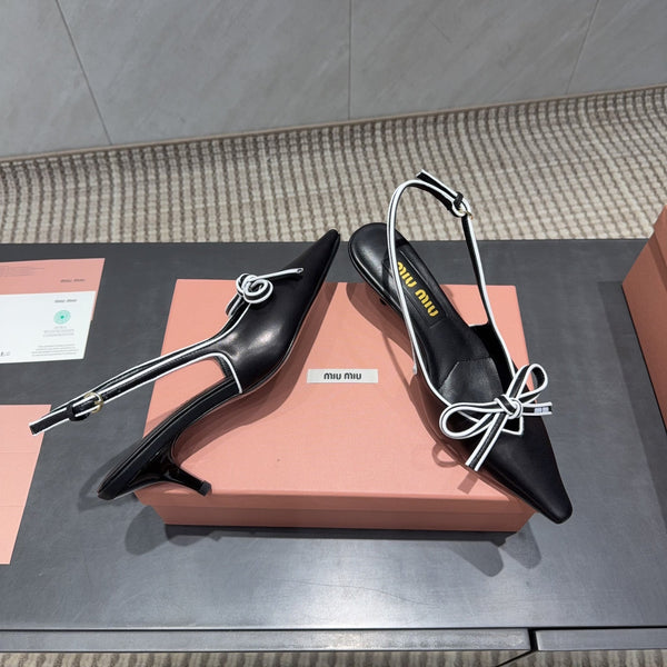 Miu 26s Slingback 55mm In Black White Calfskin With Bow