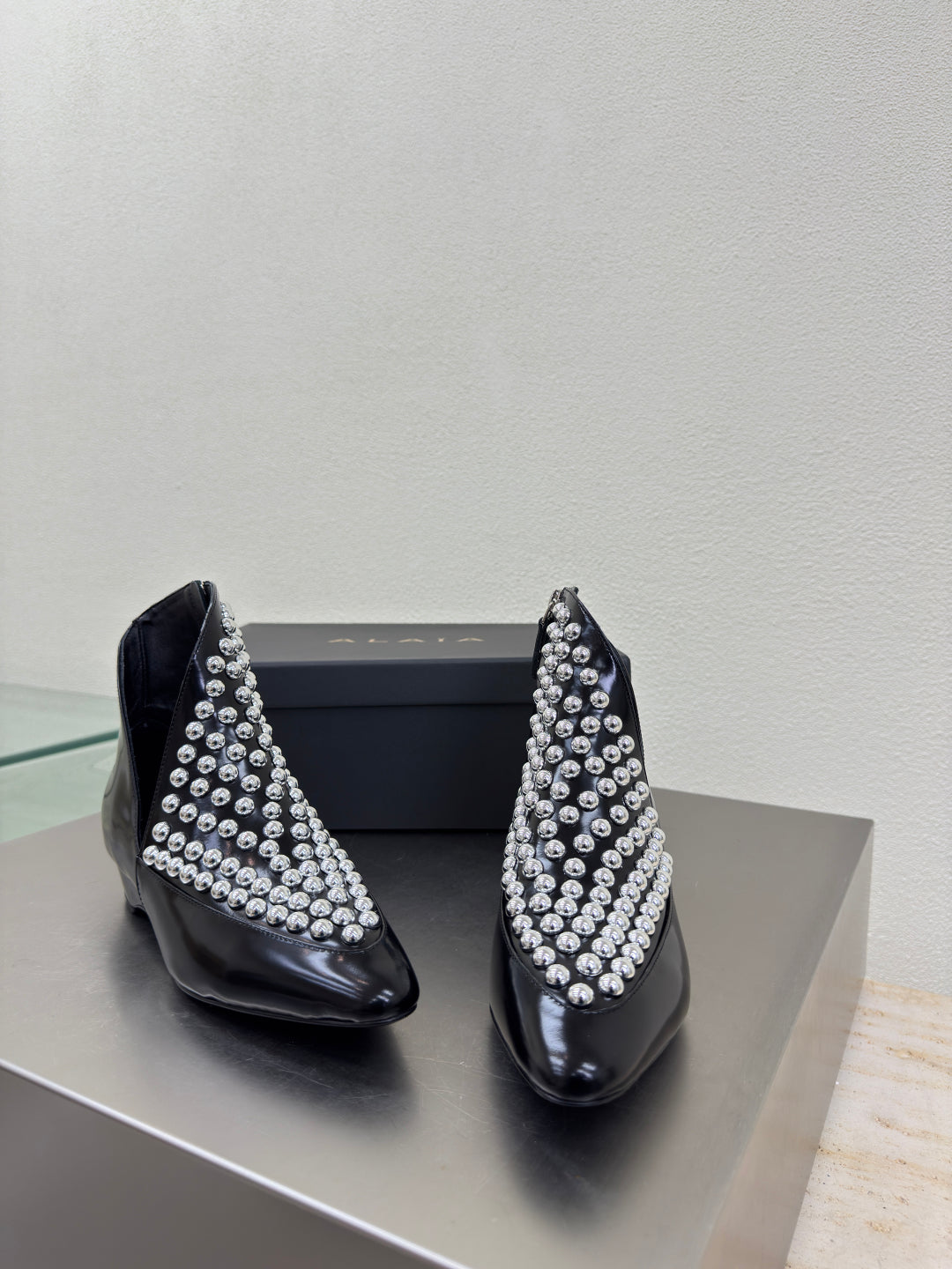 ALAIA Rivet ankle boots black cowhide leather 471093