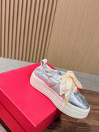 Ferragamo Bow Platform Sneaker Sliver Satin Sheepskin