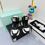 Chanel 2025 Quilted High-Top Sneakers Black White Cowhide 469789