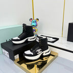 Chanel 2025 Quilted High-Top Sneakers Black White Cowhide 469789