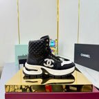 Chanel 2025 Quilted High-Top Sneakers Black White Cowhide 469789