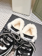 Chanel 26s Thick-Sole Sneakers In Black And White Calfskin With Fur Lining