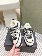 Chanel 26s Thick-Sole Sneakers In White And Black Calfskin With Fur Lining