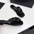 CC 25 Camellia Thong Sandals Black Sheepskin 368839