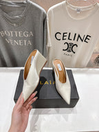 Alaia 25 Cube Wedge Mules Ivory Silk Sheepskin 300080