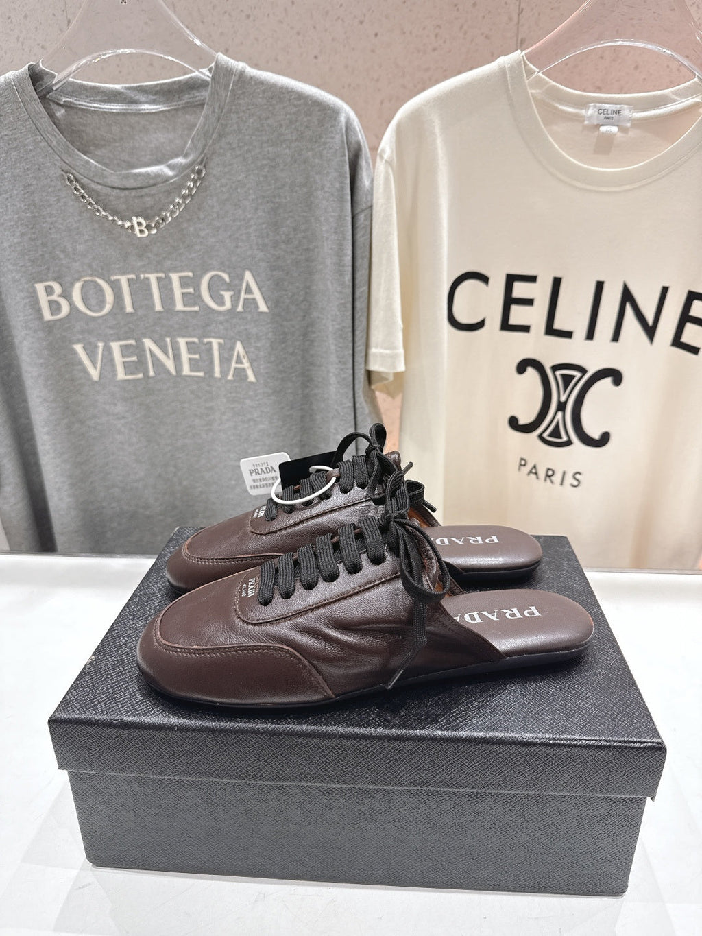 Prada 25s mule dark brown sheepskin 535501
