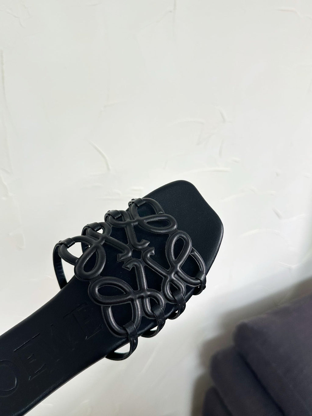 Petal Anagram Slide in Black Soft Calfskin 273512