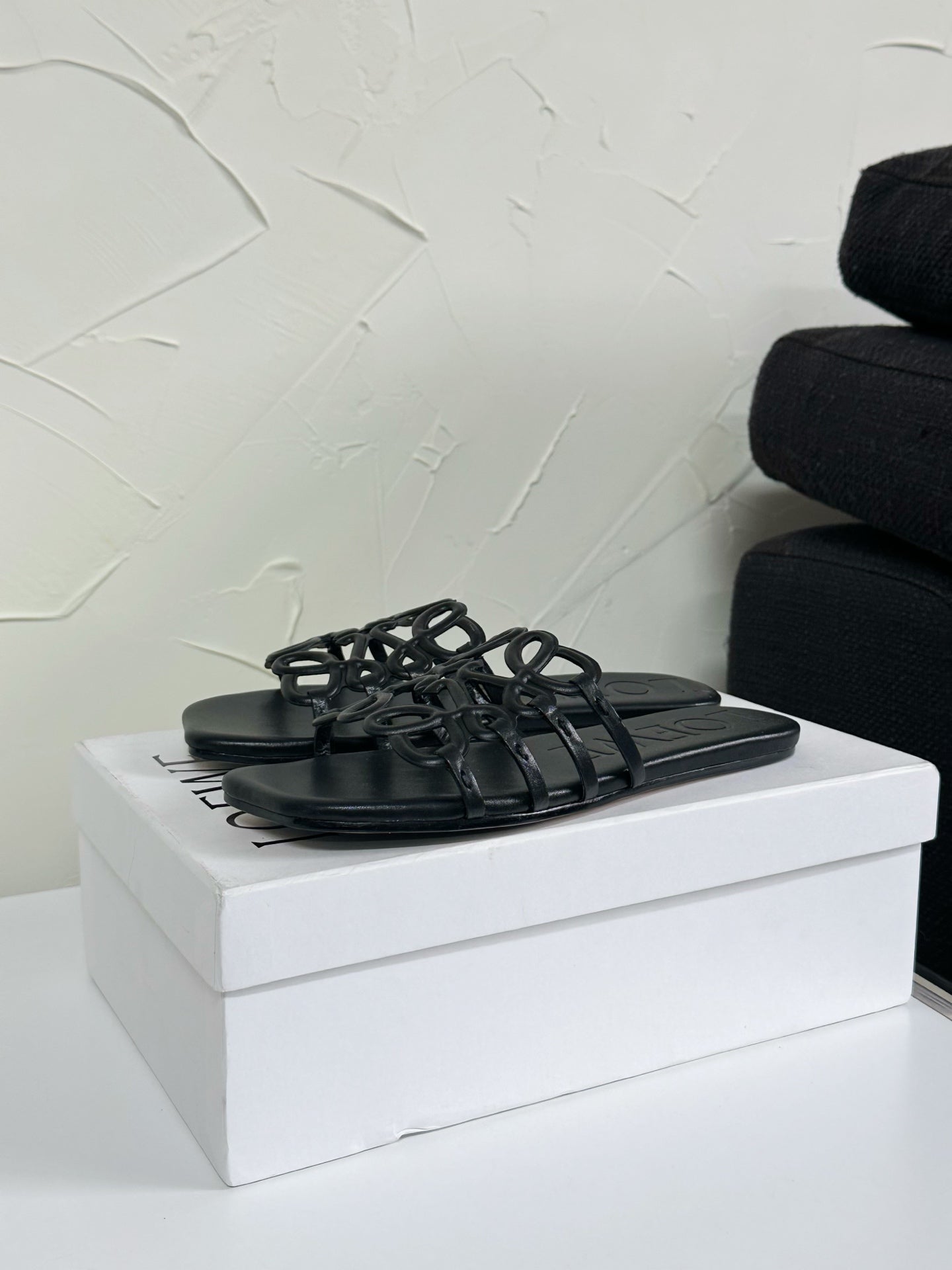 Petal Anagram Slide in Black Soft Calfskin 273512